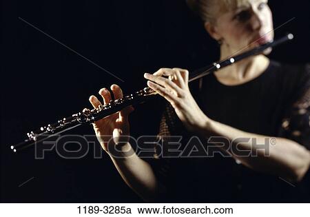 people, woman, playing, music, arts, entertainment, play View Large Photo Image Stock Image - people, woman, playing, music, arts, entertainment, play. Fotosearch