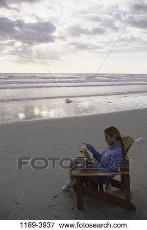 people, woman, reading, beach, book, clothed View Large Photo Image Stock Photo - people, woman, reading, beach, book, clothed. Fotosearch