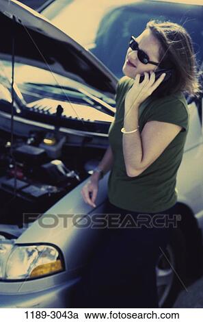 people, woman, talking, car, phone, outdoors, engine View Large Photo Image Stock Image - people, woman, talking, car, phone, outdoors, engine. Fotosearch
