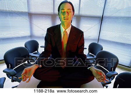 Stock Image - relaxed, meditation, Asian, business, concepts, metaphors. Fotosearch