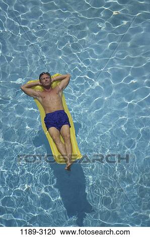 relaxed, people, swim, floating, pool, swimming View Large Photo Image Stock Image - relaxed, people, swim, floating, pool, swimming. Fotosearch