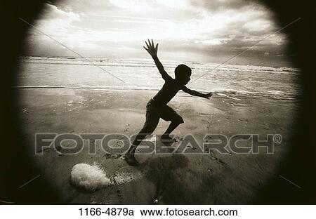 sand, people, playing, beach, playful, silhouette View Large Photo Image Stock Image - sand, people, playing, beach, playful, silhouette. Fotosearch