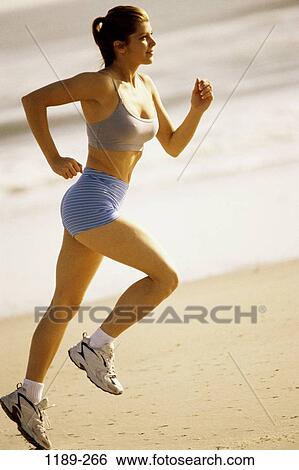 sand, people, water, running, woman, beach, jogging View Large Photo Image Stock Photograph - sand, people, water, running, woman, beach, jogging. Fotosearch