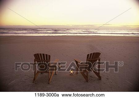 sand, water, empty, dusk, evening, sunset, beach View Large Photo Image Stock Image - sand, water, empty, dusk, evening, sunset, beach. Fotosearch