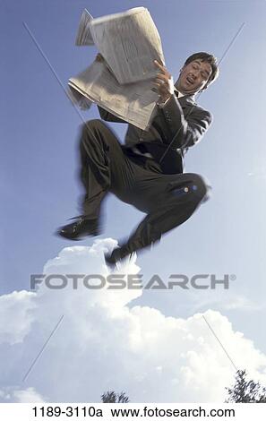 sky, people, jump, newspaper, jumping, business View Large Photo Image Stock Image - sky, people, jump, newspaper, jumping, business. Fotosearch