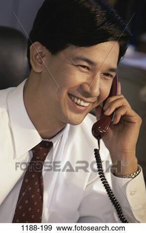 smiling, telephone, Asian, listening, phone, laughing View Large Photo Image Stock Photo - smiling, telephone, Asian, listening, phone, laughing. Fotosearch