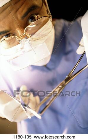 staring, eyeglasses, surgery, doctor, mask, surgeon View Large Photo Image Stock Photography - staring, eyeglasses, surgery, doctor, mask, surgeon. Fotosearch