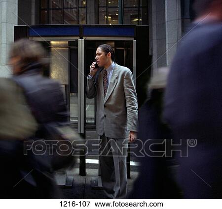 telephone, talking, Hispanic, phone, outdoors, businessman View Large Photo Image Stock Photo - telephone, talking, Hispanic, phone, outdoors, businessman. Fotosearch