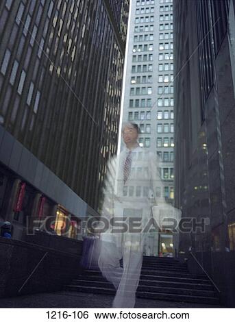 Stock Photograph - urban, buildings, walking, briefcase, business, outdoors. Fotosearch