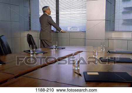 Stock Image - window, concepts, business, senior, Asian. Fotosearch