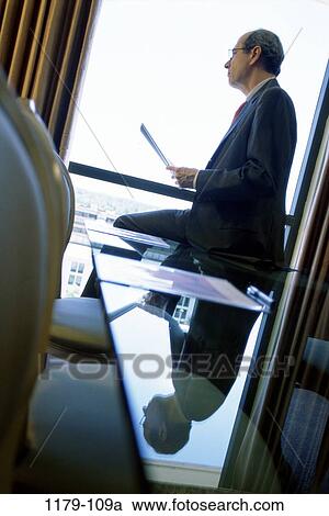 window, daydreaming, business, Middle-aged, contemplation View Large Photo Image Stock Image - window, daydreaming, business, Middle-aged, contemplation. Fotosearch