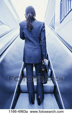 woman, briefcase, talking, phone, back, business, brunette View Large Photo Image Stock Image - woman, briefcase, talking, phone, back, business, brunette. Fotosearch