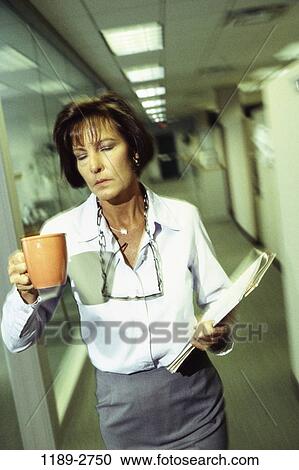 woman, busy, exhaustion, stress, business, Middle-aged, serious View Large Photo Image Stock Image - woman, busy, exhaustion, stress, business, Middle-aged, serious. Fotosearch