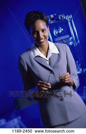 woman, smiling, business, indoors, African-American, businesswoman, young adult View Large Photo Image Stock Image - woman, smiling, business, indoors, African-American, businesswoman, young adult. Fotosearch