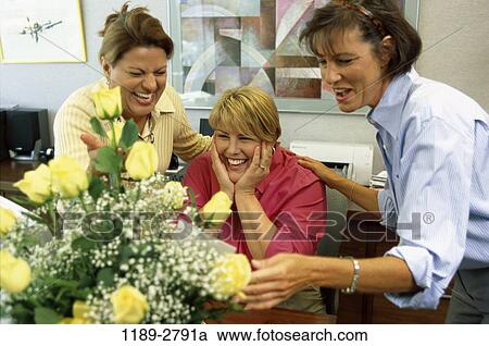 women, people, desk, happy, flowers, business View Large Photo Image Stock Image - women, people, desk, happy, flowers, business. Fotosearch