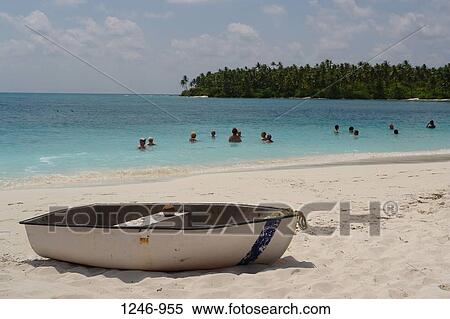 Stock Photography - Boat on the beach, Suheli Par, Lakshadweep, India. Fotosearch