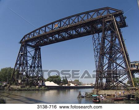 Stock Photograph - Bridge across a river, El Riachuelo, Buenos Aires, Argentina. Fotosearch