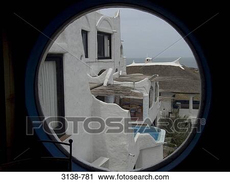 Buildings viewed through a circular window, Punta del Este, Maldonado, Uruguay View Large Photo Image Stock Image - Buildings viewed through a circular window, Punta del Este, Maldonado, Uruguay. Fotosearch