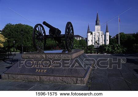 Stock Photography - Cannon with a cathedral in the background, St. Louis Cathedral, New Orleans, Louisiana, USA. Fotosearch