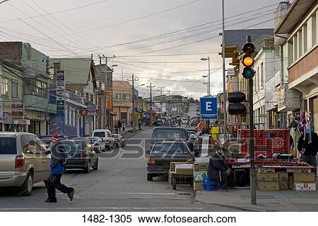 Stock Photography - Cars on the street in a city, Punta Arenas, Chile. Fotosearch