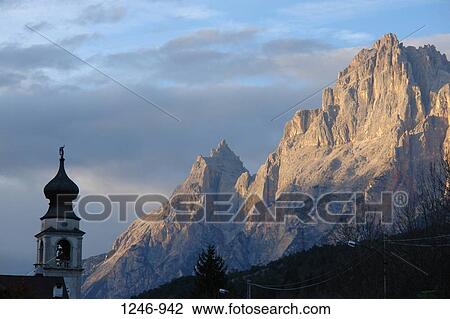 Stock Image - Church near a mountain, Monte Antelao, Borca di Cadore, Veneto, Italy. Fotosearch