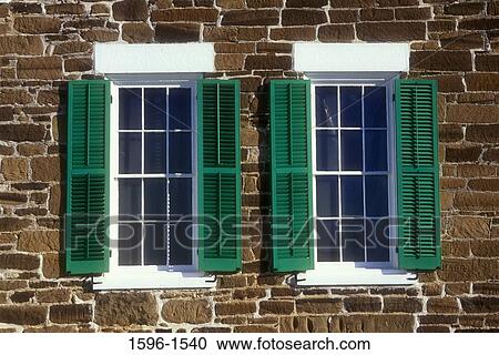 Stock Image - Close-up of two open windows of a building, Fort Larned National Historic Site, Kansas, USA. Fotosearch