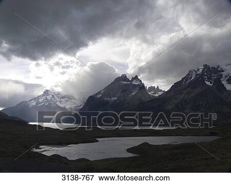 Clouds over mountains, Torres del Paine National Park, Patagonia, Chile View Large Photo Image Stock Photo - Clouds over mountains, Torres del Paine National Park, Patagonia, Chile. Fotosearch