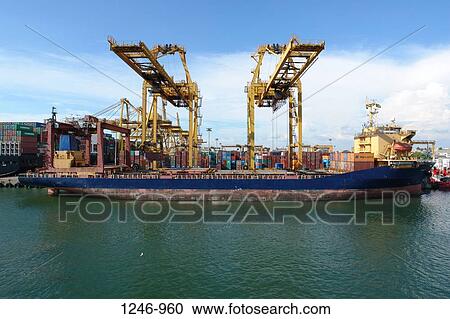 Container ship at a commercial dock, Colombo, Sri Lanka View Large Photo Image Stock Image - Container ship at a commercial dock, Colombo, Sri Lanka. Fotosearch