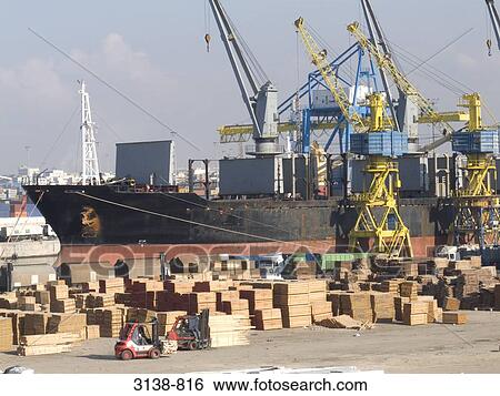 Container ship at a commercial dock, Casablanca, Morocco View Large Photo Image Stock Photograph - Container ship at a commercial dock, Casablanca, Morocco. Fotosearch