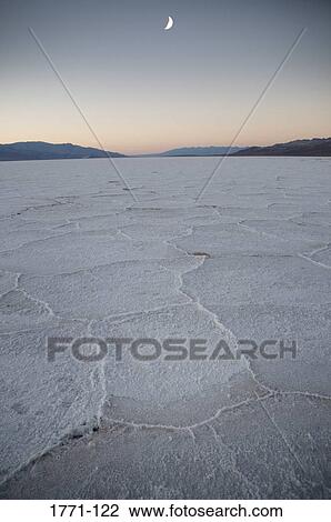 Crescent moon over a lake, Badwater, Death Valley, Death Valley National Park, California, USA View Large Photo Image Stock Image - Crescent moon over a lake, Badwater, Death Valley, Death Valley National Park, California, USA. Fotosearch