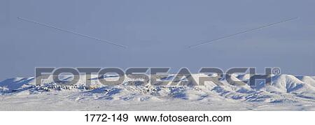 Desert covered with snow, Wyoming, USA View Large Photo Image Stock Photo - Desert covered with snow, Wyoming, USA. Fotosearch
