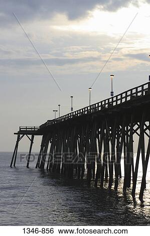 Fishing pier over the sea, Carolina Beach, North Carolina, USA View Large Photo Image Stock Photograph - Fishing pier over the sea, Carolina Beach, North Carolina, USA. Fotosearch