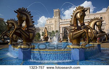 Fountain in front of a hotel, Madinat Jumeirah Hotel, Dubai, United Arab Emirates View Large Photo Image Stock Photo - Fountain in front of a hotel, Madinat Jumeirah Hotel, Dubai, United Arab Emirates. Fotosearch