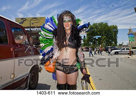 Gay man in female clothing participating in a gay pride parade, Minneapolis, Minnesota, USA View Large Photo Image Stock Image - Gay man in female clothing participating in a gay pride parade, Minneapolis, Minnesota, USA. Fotosearch