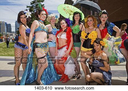 Gay men in female clothing participating in a gay pride parade, Minneapolis, Minnesota, USA View Large Photo Image Stock Image - Gay men in female clothing participating in a gay pride parade, Minneapolis, Minnesota, USA. Fotosearch