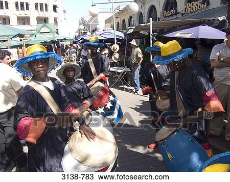Group of people playing drums in a traditional festival, Montevideo, Uruguay View Large Photo Image Stock Image - Group of people playing drums in a traditional festival, Montevideo, Uruguay. Fotosearch