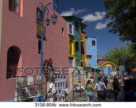 Group of people walking in a street, La Boca, Buenos Aires, Argentina View Large Photo Image Stock Image - Group of people walking in a street, La Boca, Buenos Aires, Argentina. Fotosearch