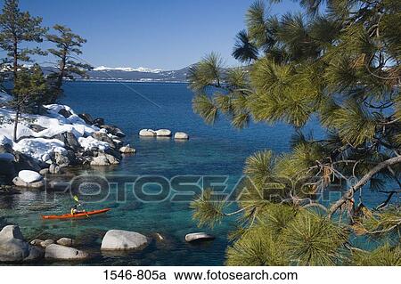 High angle view of a man kayaking in a lake, Lake Tahoe, Nevada, USA View Large Photo Image Stock Image - High angle view of a man kayaking in a lake, Lake Tahoe, Nevada, USA. Fotosearch