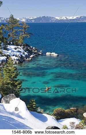 High angle view of a man kayaking in a lake, Lake Tahoe, Nevada, USA View Large Photo Image Stock Image - High angle view of a man kayaking in a lake, Lake Tahoe, Nevada, USA. Fotosearch