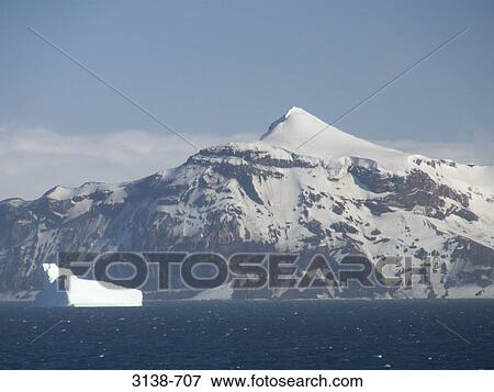 Iceberg floating on water, Bransfield Strait, Antarctica View Large Photo Image Stock Photo - Iceberg floating on water, Bransfield Strait, Antarctica. Fotosearch