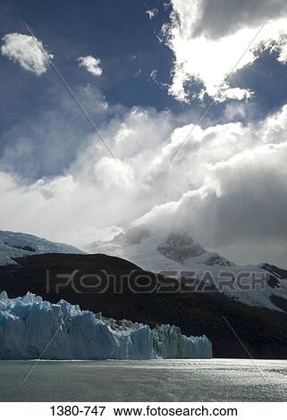 Stock Photo - Icebergs floating on water, El Calafate, Patagonia, Argentina. Fotosearch