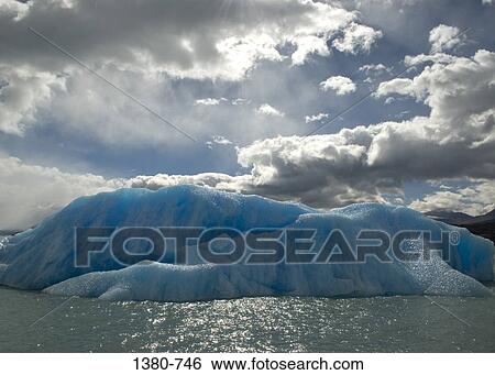 Icebergs floating on water, El Calafate, Patagonia, Argentina View Large Photo Image Stock Photograph - Icebergs floating on water, El Calafate, Patagonia, Argentina. Fotosearch