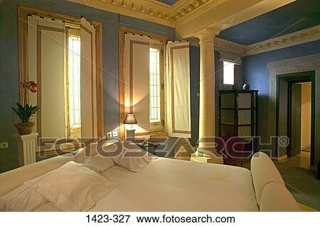 Stock Photo - Interiors of a hotel room, Casa de Madrid, Madrid, Spain. Fotosearch