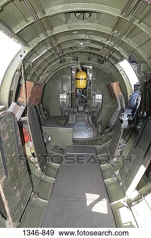 Stock Photo - Interiors of a WW-II Bomber plane. Fotosearch