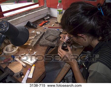 Jeweler working on a ring in workshop, Buenos Aires, Argentina View Large Photo Image Stock Photography - Jeweler working on a ring in workshop, Buenos Aires, Argentina. Fotosearch