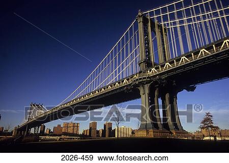 Low angle view of a bridge with buildings in the background, Manhattan Bridge, Brooklyn, New York City, New York State, USA View Large Photo Image Stock Photo - Low angle view of a bridge with buildings in the background, Manhattan Bridge, Brooklyn, New York City, New York State, USA. Fotosearch