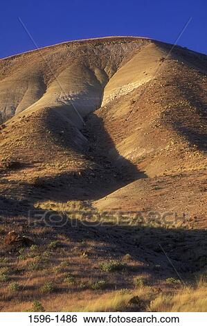 Stock Photograph - Low angle view of a hill, Carroll Rim, John Day Fossil Beds National Monument, Oregon, USA. Fotosearch