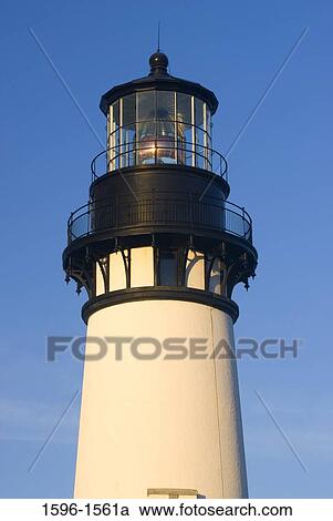 Stock Image - Low angle view of a lighthouse, Yaquina Head Lighthouse, Yaquina Head Outstanding Natural Area, Salem District Bureau of Land Management, Oregon, USA. Fotosearch