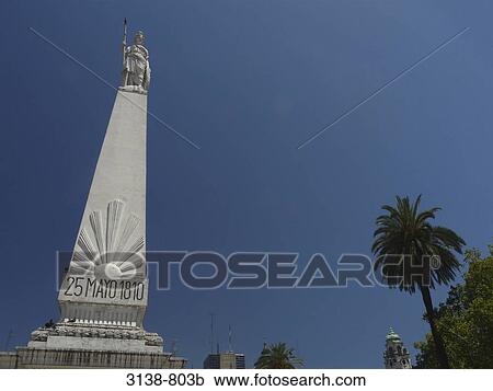 Stock Image - Low angle view of a monument, Piramide de Mayo, Plaza de Mayo, Buenos Aires, Argentina. Fotosearch