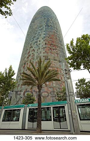 Stock Photography - Low angle view of a tower, Torre Agbar, Barcelona, Catalonia, Spain. Fotosearch